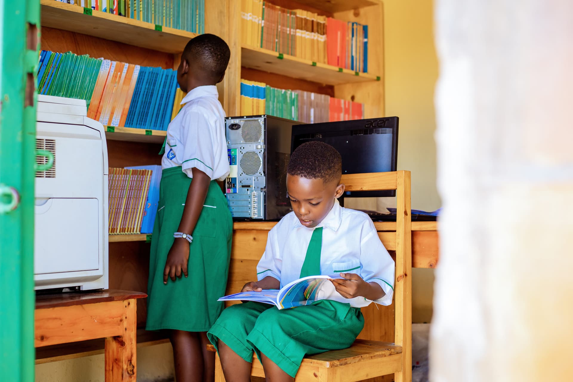 A learner reading in the school library